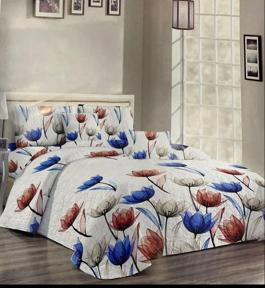 Floral patterned bedspread.
