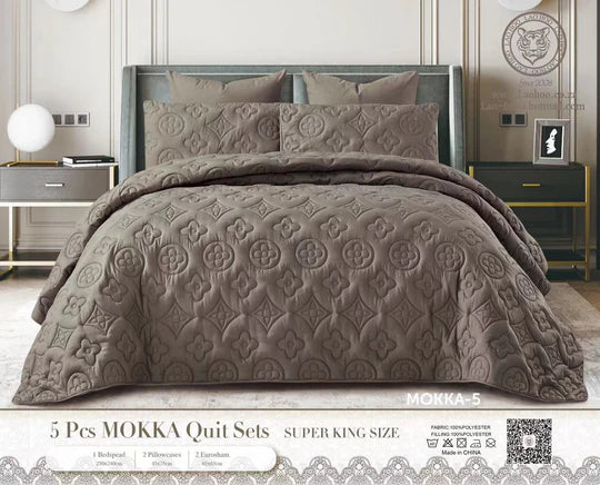 Brown quilt set on.