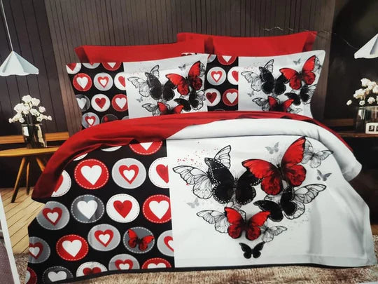 Bedding set with butterfly and heart patterns.