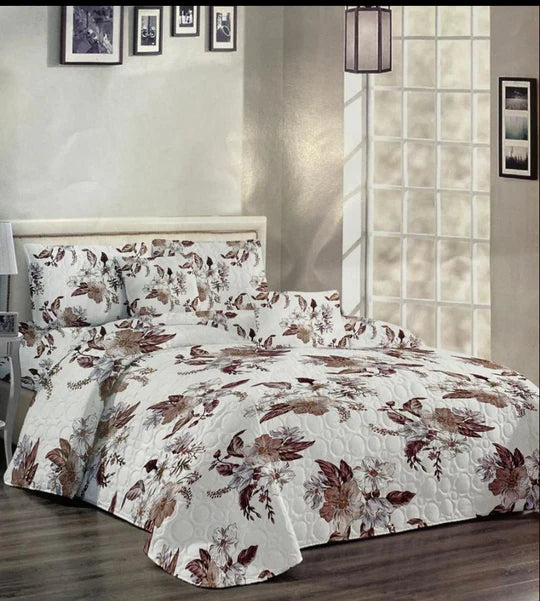 Floral patterned bedspread. 